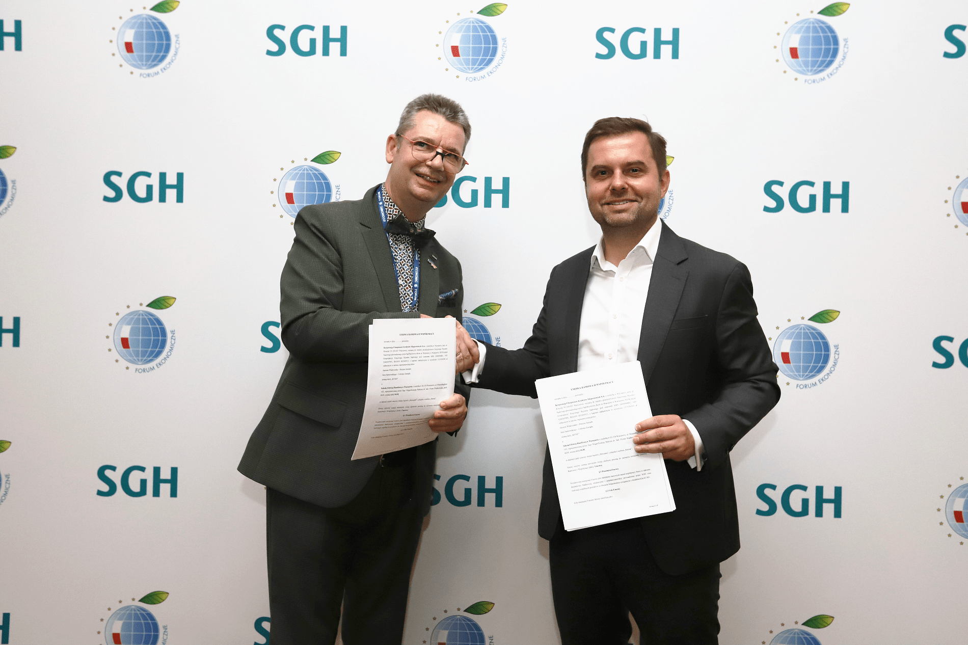 Od lewej: Prof. Piotr Wachowiak - rektor SGH, Janusz Władyczak - prezes KUKE